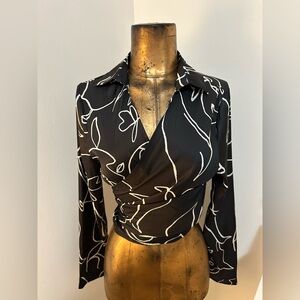 Women’s black abstract print long sleeve blouse